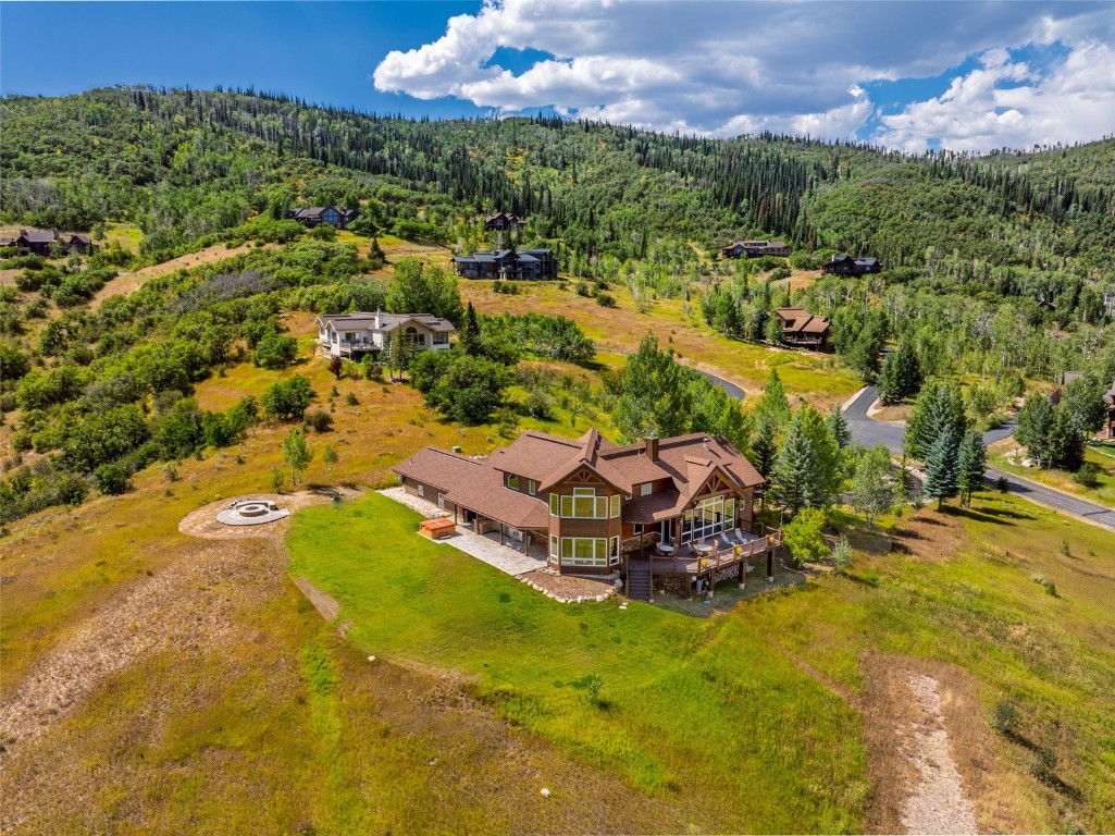 31105 Country Side Road Steamboat Springs, CO 80487 - Photo 22 of 50 an aerial view of a house with a yard basket ball court and outdoor seating