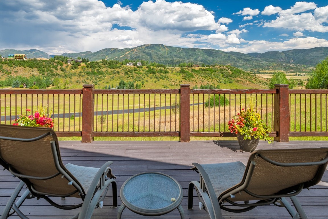 31105 Country Side Road Steamboat Springs, CO 80487 - Photo 24 of 50 a view of a chairs and table in a balcony