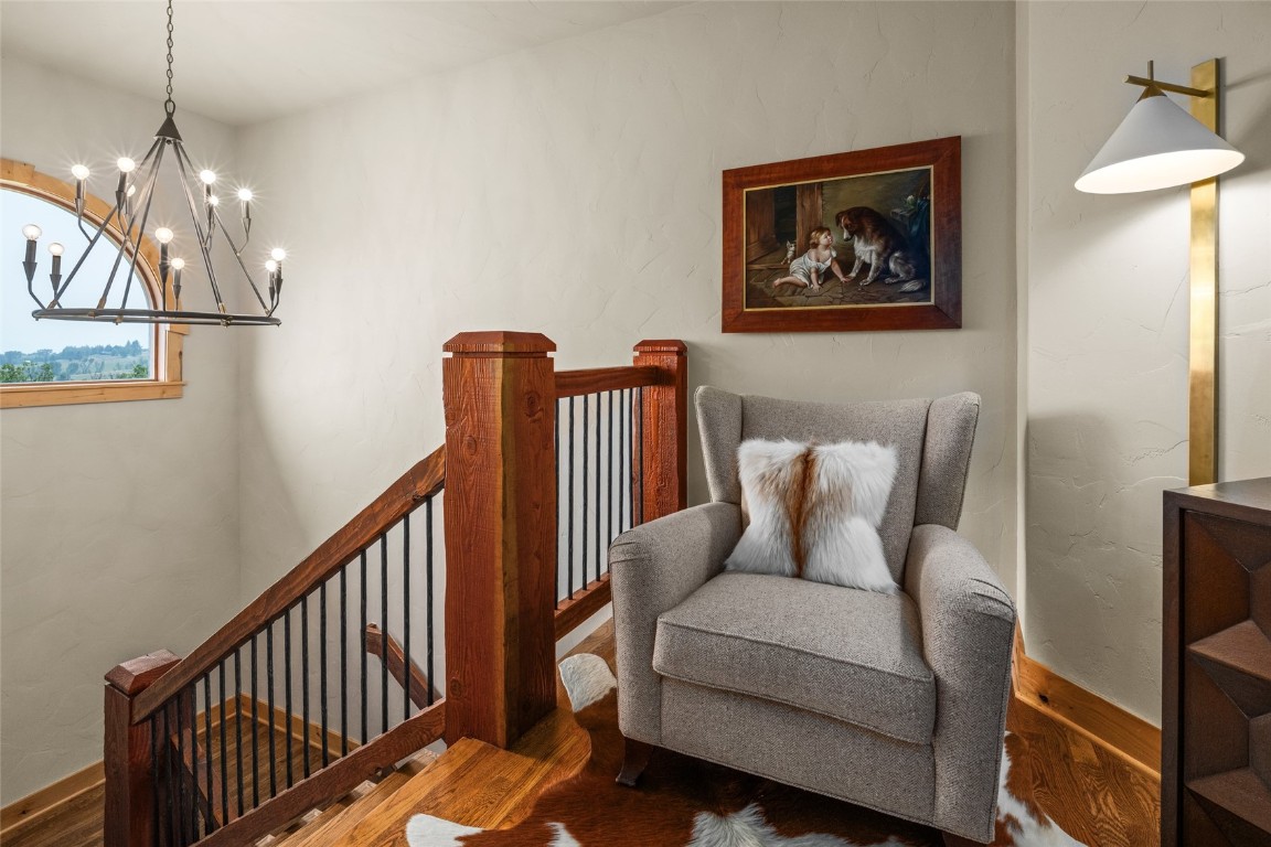 31105 Country Side Road Steamboat Springs, CO 80487 - Photo 26 of 50 a living room with furniture and a chandelier