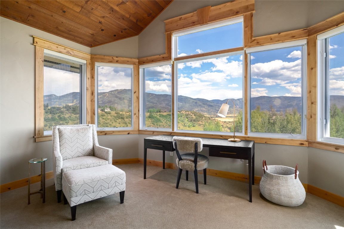 31105 Country Side Road Steamboat Springs, CO 80487 - Photo 27 of 50 a living room with furniture and a window