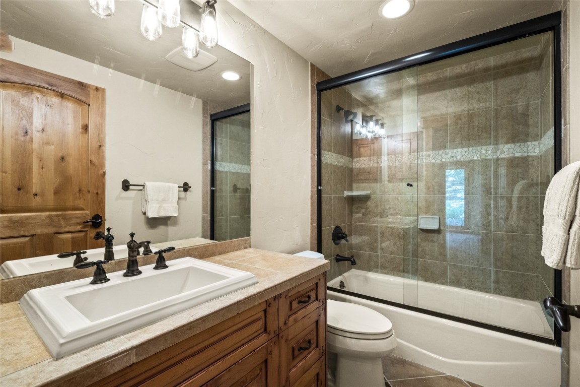 31105 Country Side Road Steamboat Springs, CO 80487 - Photo 50 of 50 a bathroom with a sink a toilet and shower