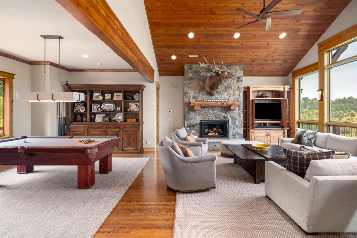 31105 Country Side Road Steamboat Springs, CO 80487 - Photo 7 of 50 a living room with furniture fireplace and flat screen tv