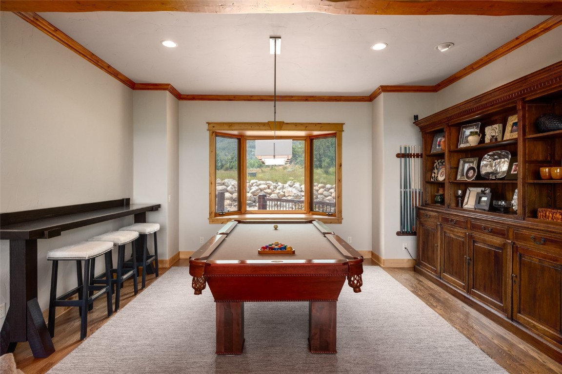 31105 Country Side Road Steamboat Springs, CO 80487 - Photo 9 of 50 a living room with furniture a table and a large window