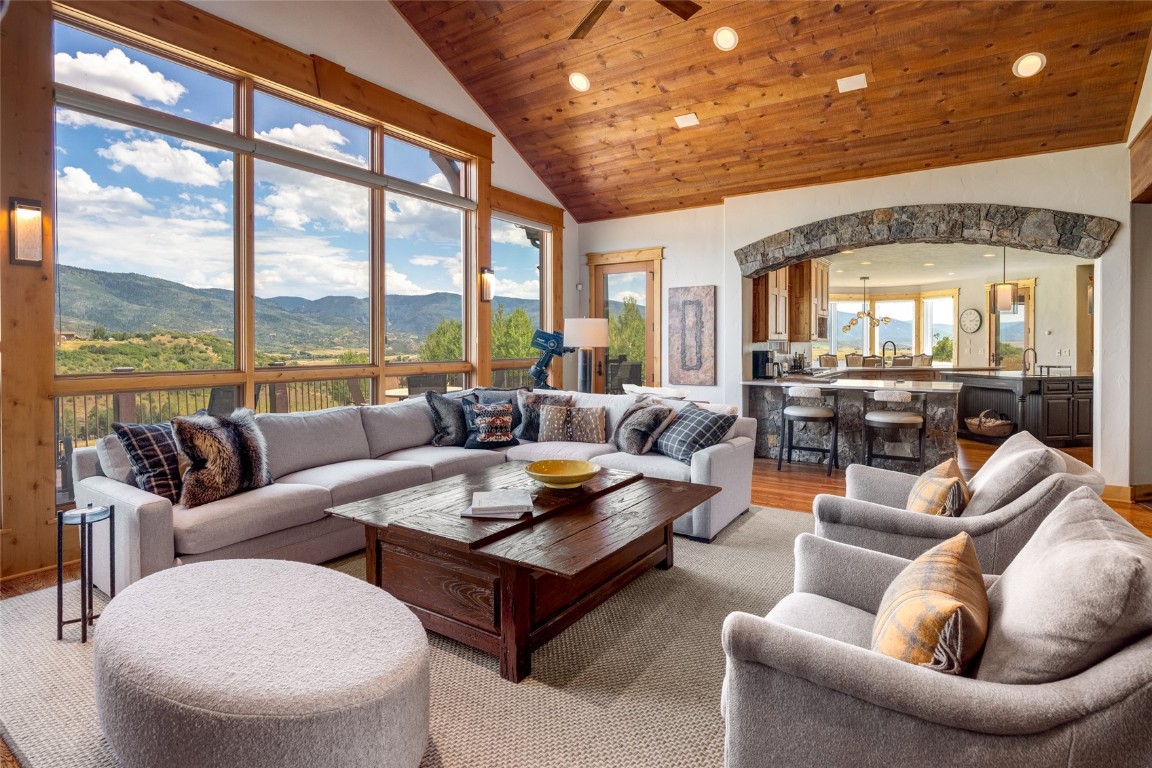 31105 Country Side Road Steamboat Springs, CO 80487 - Photo 10 of 50 a living room with furniture and a large window