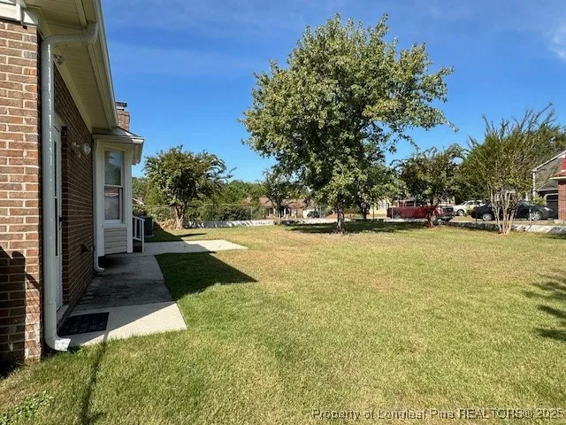 a view of yard with tree