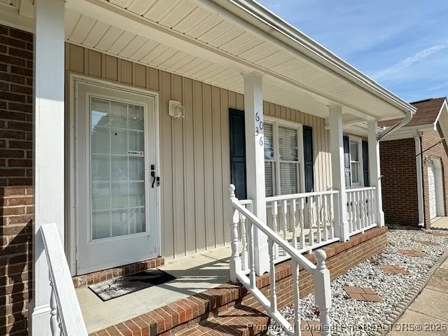 a view of a balcony with chair