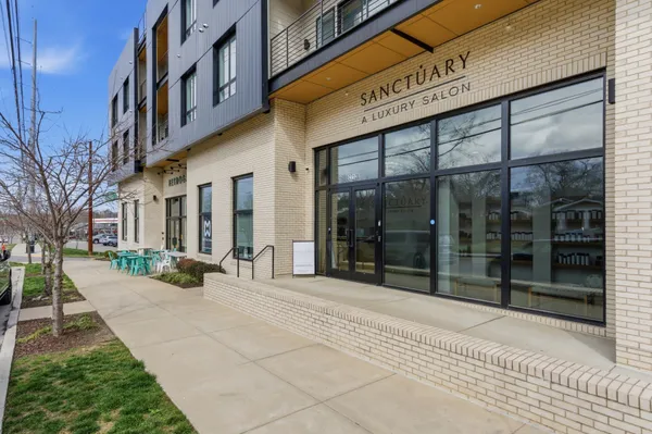 a building with glass door and windows
