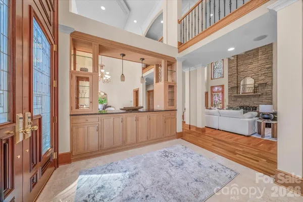 a living room with furniture fireplace and a flat screen tv