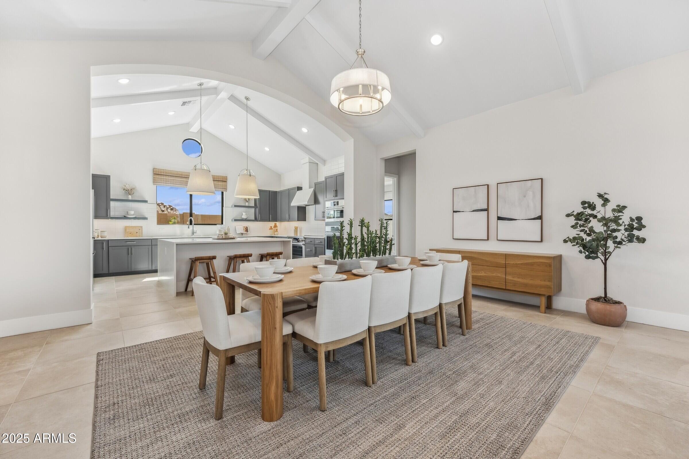 621 East Grayling Road San Tan Valley, AZ 85140 - Photo 11 of 33 a view of a dining room with furniture and chandelier