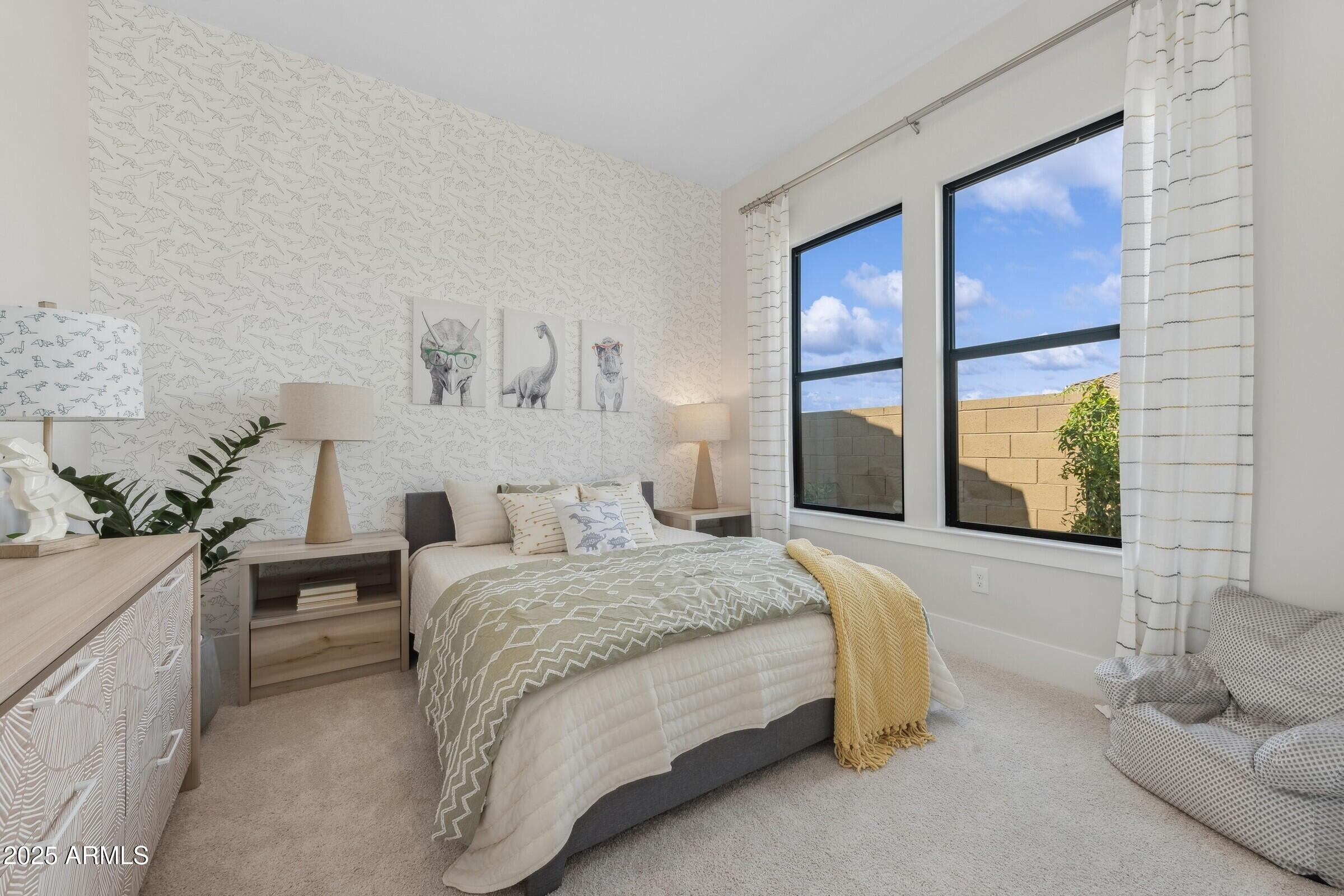 621 East Grayling Road San Tan Valley, AZ 85140 - Photo 15 of 33 a bedroom with a large bed and a window