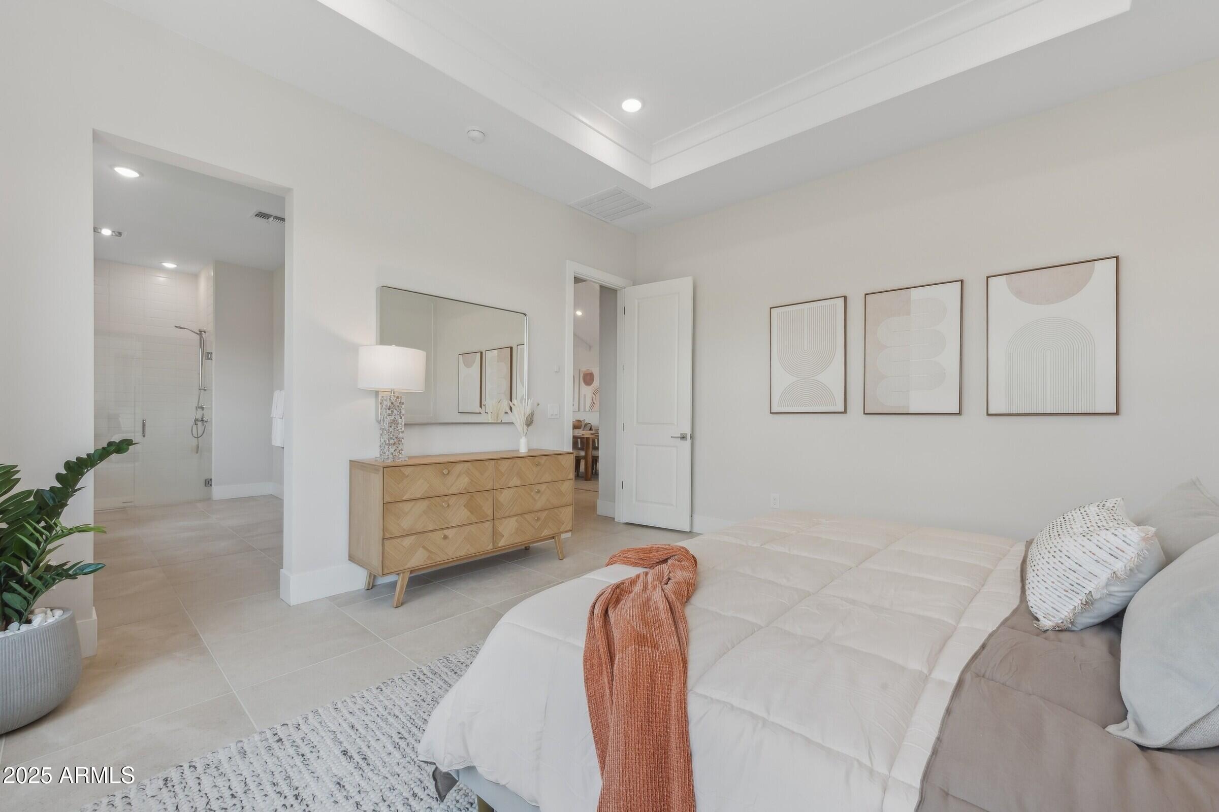 621 East Grayling Road San Tan Valley, AZ 85140 - Photo 27 of 33 a bathroom with a bathtub sink and mirror