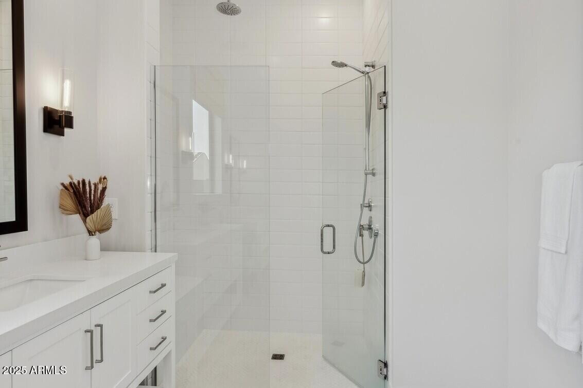 621 East Grayling Road San Tan Valley, AZ 85140 - Photo 30 of 33 a bathroom with a shower and a sink