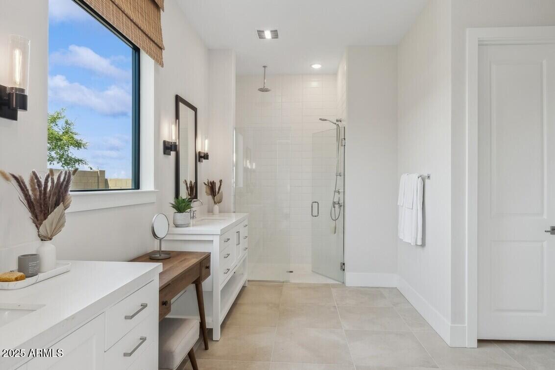 621 East Grayling Road San Tan Valley, AZ 85140 - Photo 31 of 33 a bathroom with a sink and a mirror
