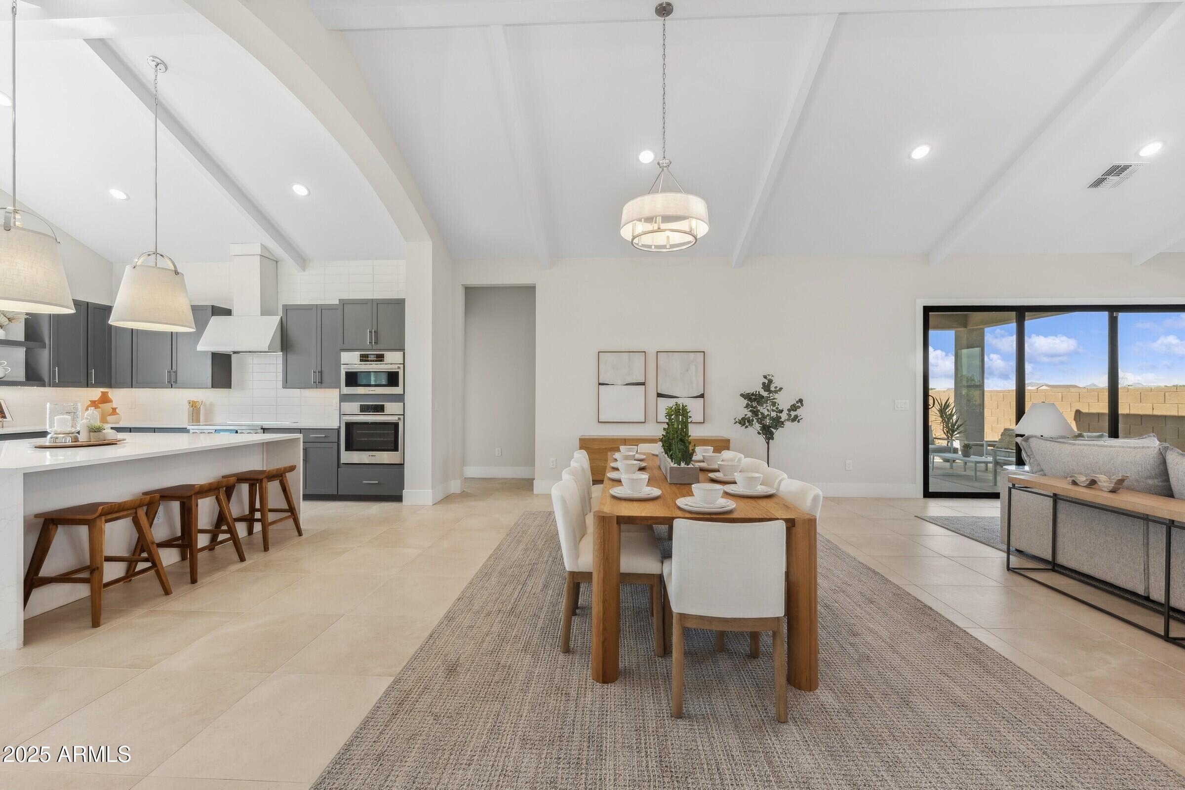 621 East Grayling Road San Tan Valley, AZ 85140 - Photo 6 of 33 a view of a dining room with furniture and wooden floor