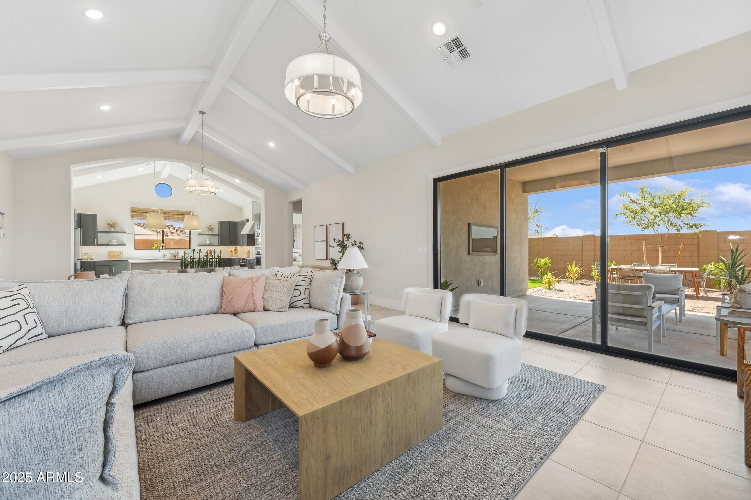 621 East Grayling Road San Tan Valley, AZ 85140 - Photo 9 of 33 a living room with furniture and a large window
