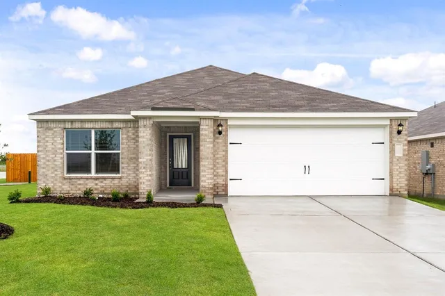 a front view of house with yard