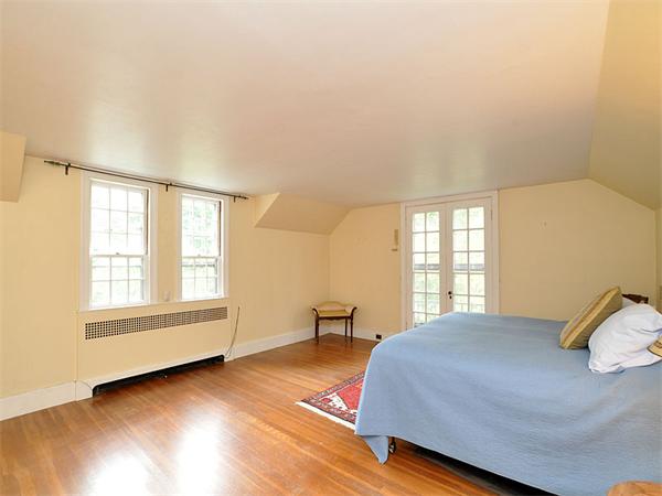435 High Street Walpole, MA 02081 - Photo 12 of 24 a bedroom with a bed and a window with chair