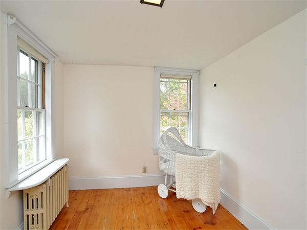 435 High Street Walpole, MA 02081 - Photo 16 of 24 a room with wooden floor and a window