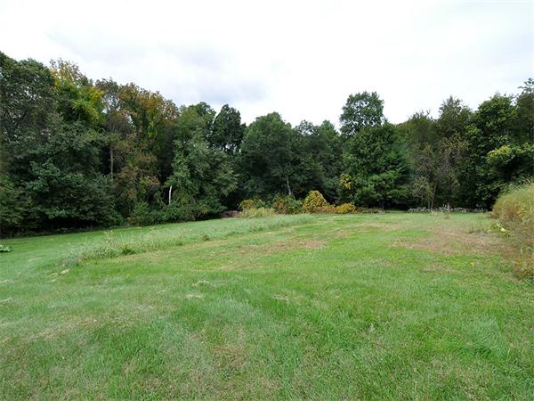 435 High Street Walpole, MA 02081 - Photo 21 of 24 a view of an outdoor space with a lake view