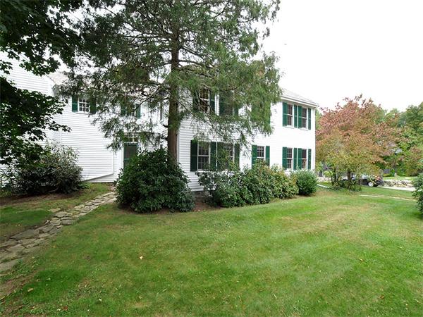 435 High Street Walpole, MA 02081 - Photo 24 of 24 a front view of a house with a yard