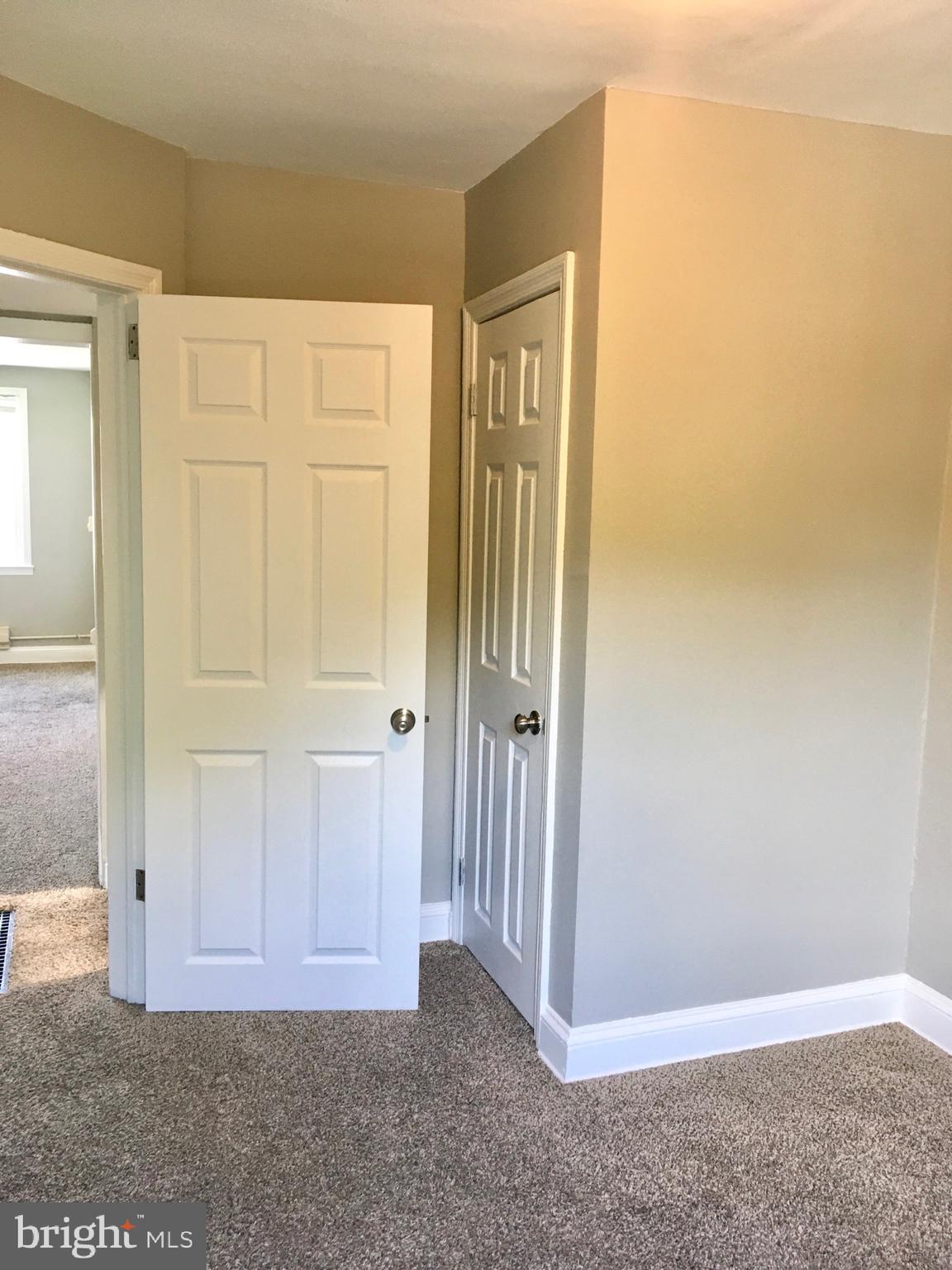 7235 Holabird Avenue, Unit B Dundalk, MD 21222 - Photo 15 of 15 an empty room with closet area