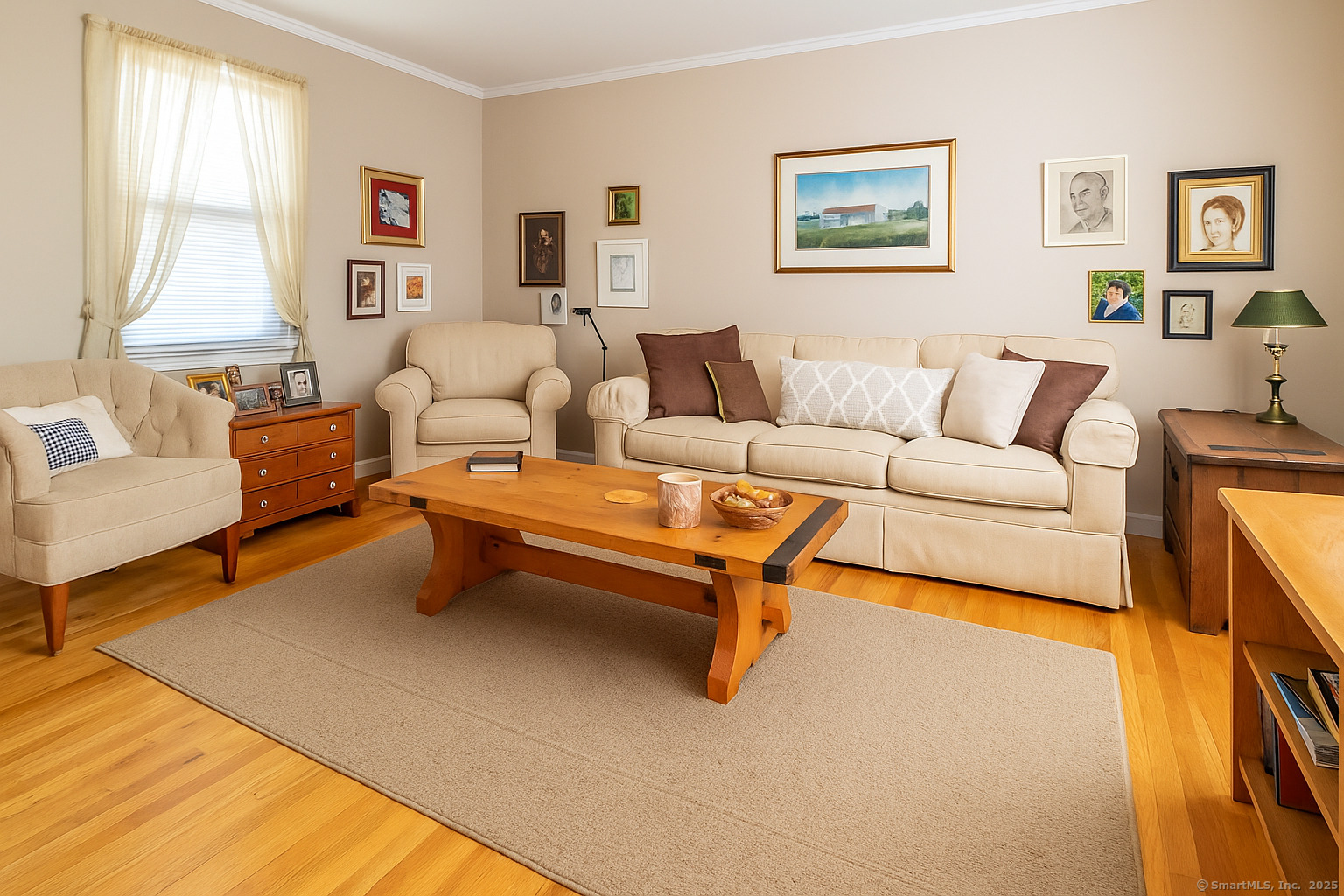 19 Prospect Ridge, Unit 14 Ridgefield, CT 06877 - Photo 11 of 36 a living room with furniture and a large window