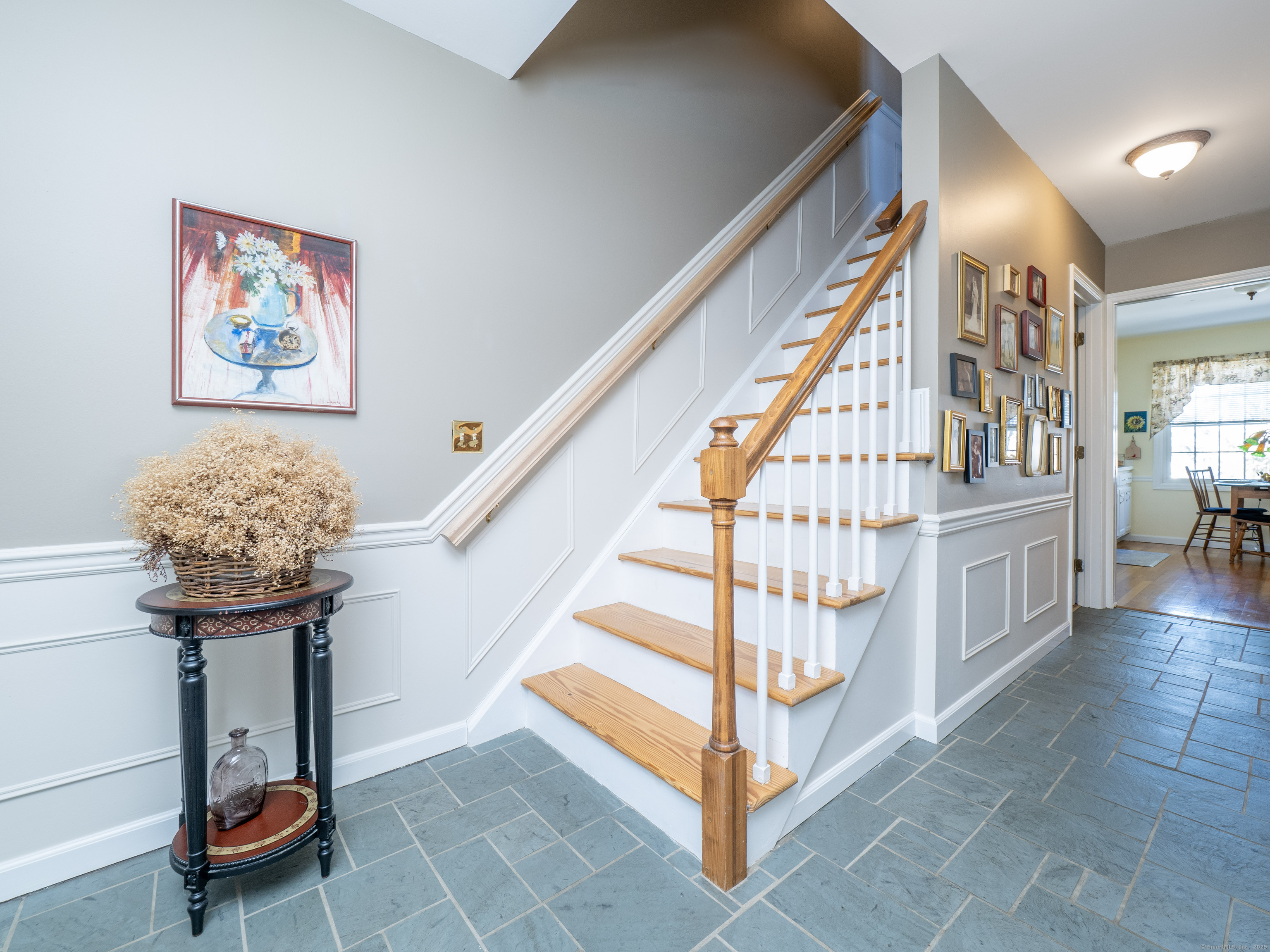 19 Prospect Ridge, Unit 14 Ridgefield, CT 06877 - Photo 3 of 36 a view of entryway with workspace and stairs