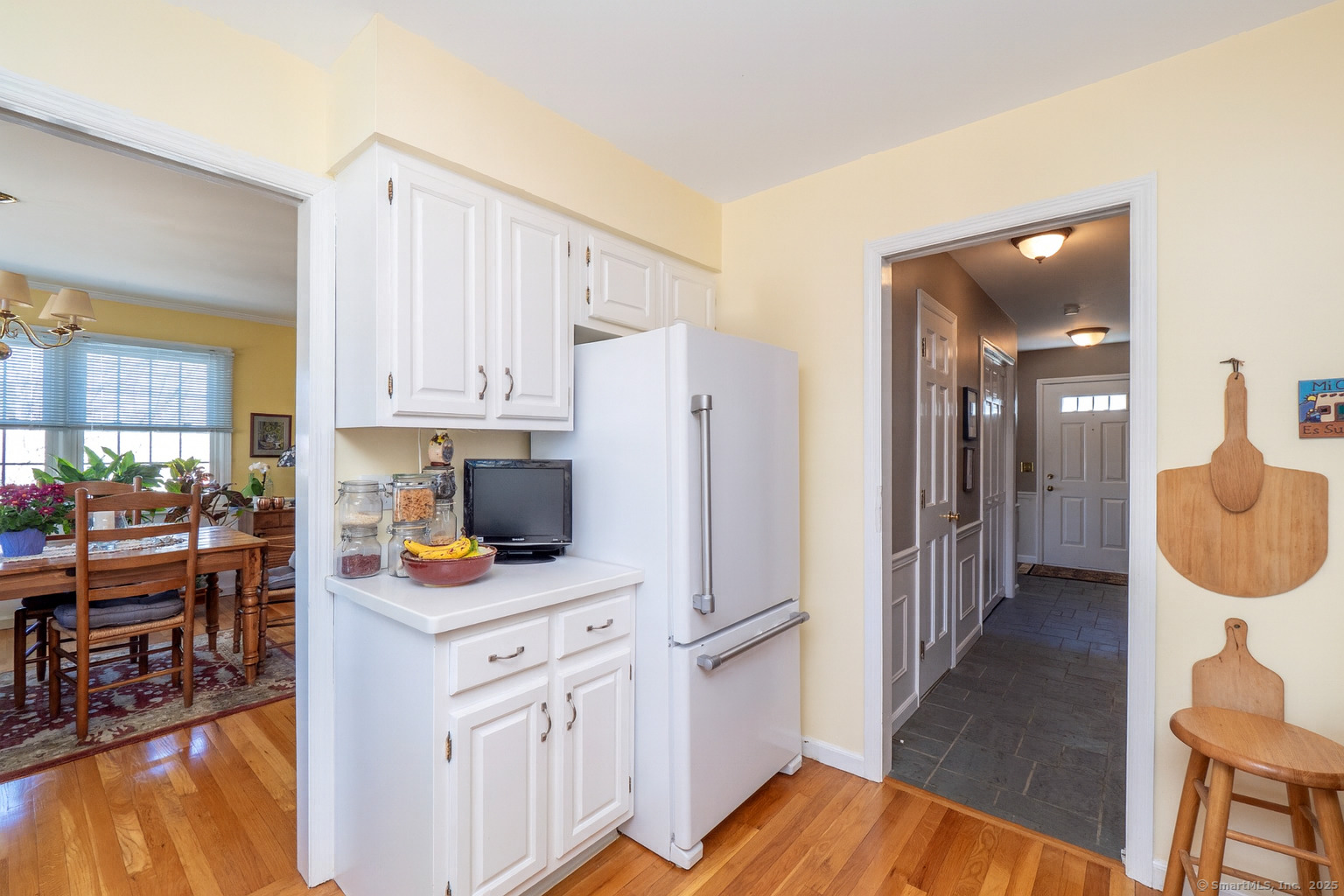 19 Prospect Ridge, Unit 14 Ridgefield, CT 06877 - Photo 7 of 36 a kitchen with a sink cabinets and wooden floor