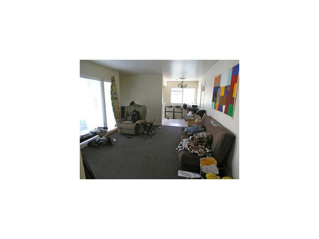 847 Rollins Road Burlingame, CA 94010 - Photo 7 of 9 a living room with furniture and a potted plant
