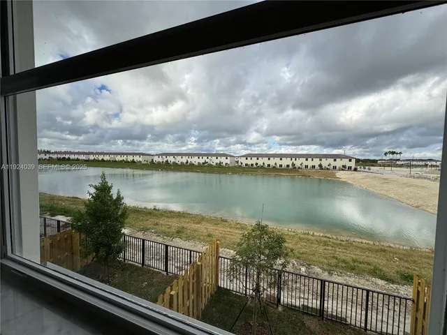 a view of a lake with a outdoor space