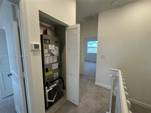 a view of hallway with stairs