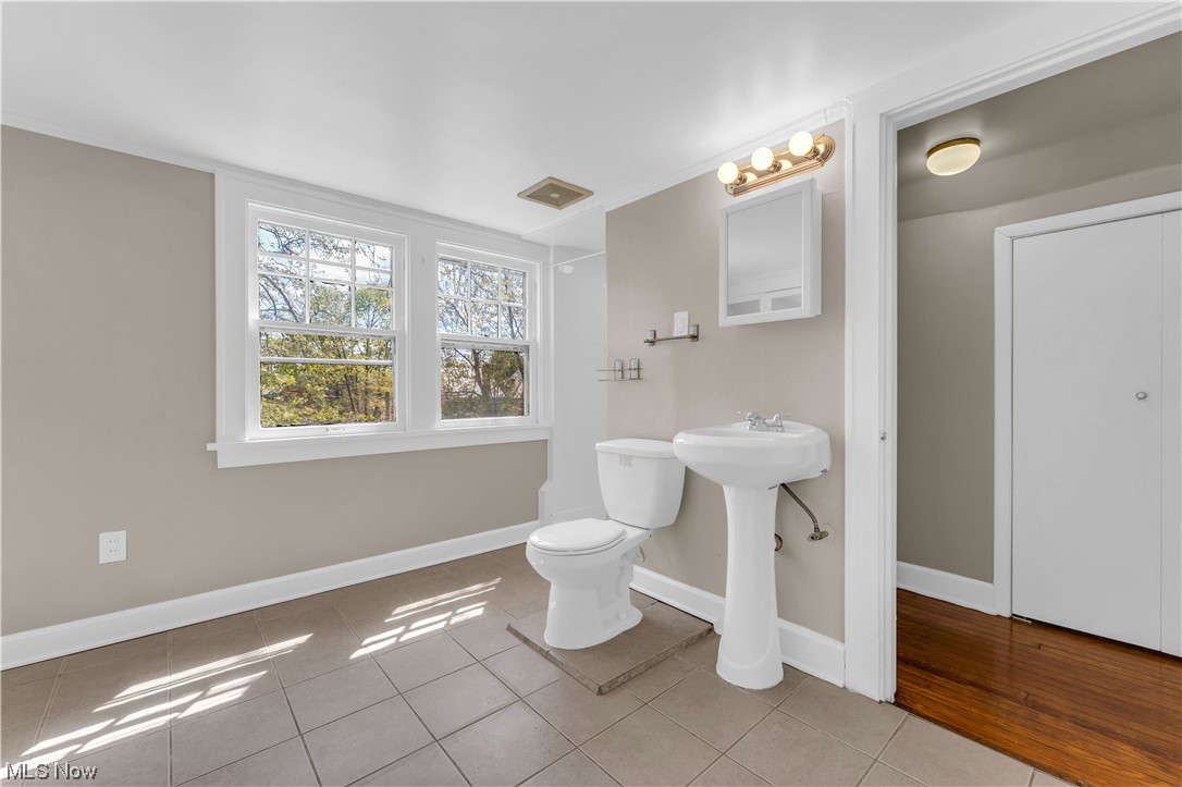 3609 Strandhill Road Shaker Heights, OH 44122 - Photo 10 of 47 Bathroom with toilet and wood-type flooring