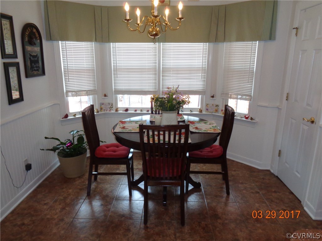13018 Chipstead Road Chester, VA 23831 - Photo 13 of 47 a view of a dining room with furniture and window