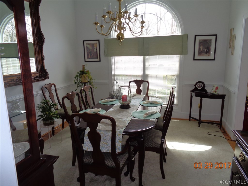 13018 Chipstead Road Chester, VA 23831 - Photo 14 of 47 a dining room with furniture and window