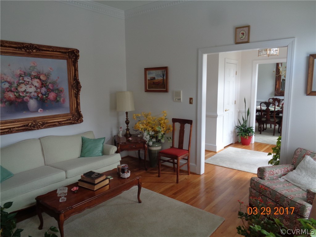 13018 Chipstead Road Chester, VA 23831 - Photo 21 of 47 a living room with furniture and wooden floor