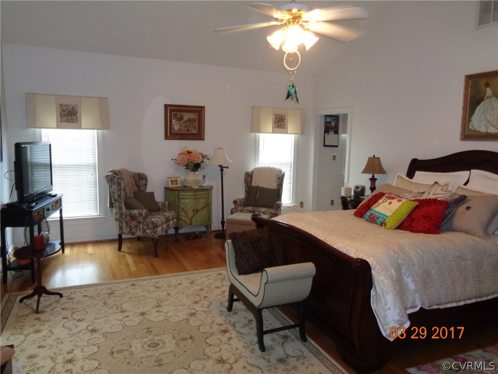 13018 Chipstead Road Chester, VA 23831 - Photo 24 of 47 a bedroom with a bed and a couch