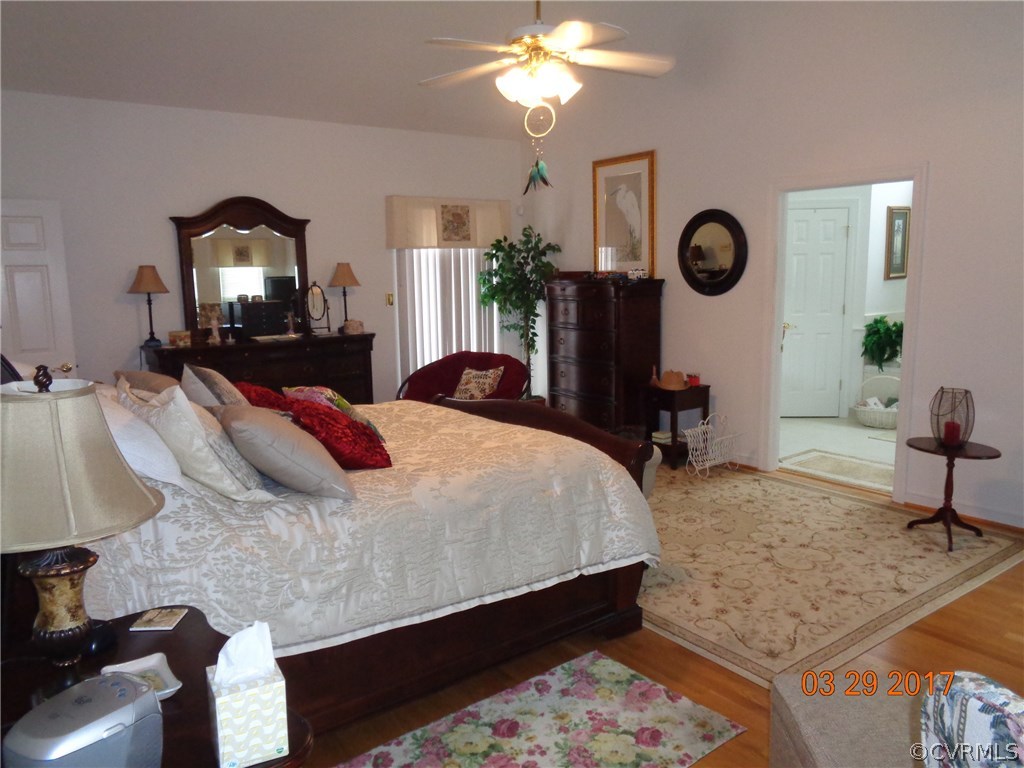 13018 Chipstead Road Chester, VA 23831 - Photo 25 of 47 a bedroom with bed mirror and window