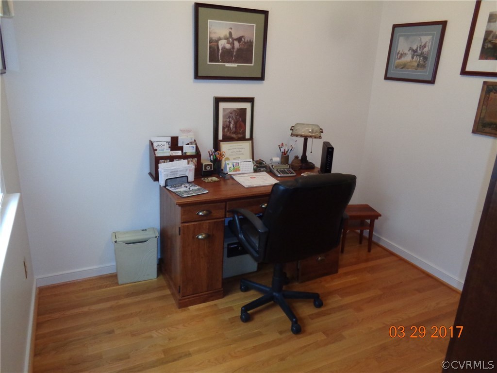 13018 Chipstead Road Chester, VA 23831 - Photo 27 of 47 a view of a workspace with furniture and a window