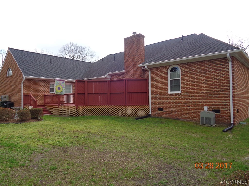 13018 Chipstead Road Chester, VA 23831 - Photo 7 of 47 a backyard of a house with lots of green space