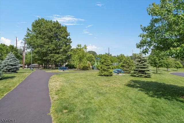 a swimming pool with wooden fence