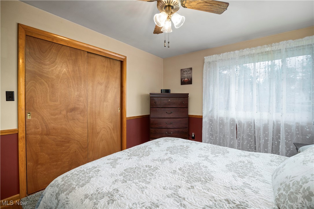 20114 Drake Road Strongsville, OH 44149 - Photo 16 of 35 Bedroom with a closet and a ceiling fan