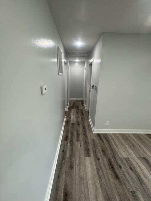 2375 Arrow Street Portage, IN 46368 - Photo 12 of 13 a view of a hallway with wooden floor