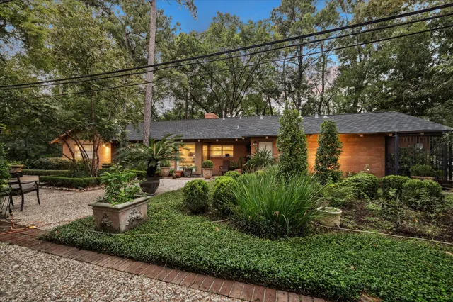 a view of a garden with a patio