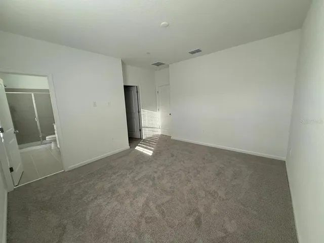 an empty room with closet