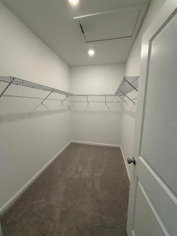 a view of a room with racks on the wall