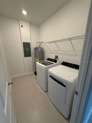 a utility room with dryer and washer