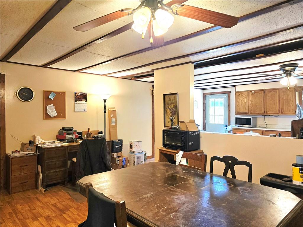 609 Trout Run Road Punxsutawney, PA 15767 - Photo 11 of 34 a kitchen with a table chairs and stove