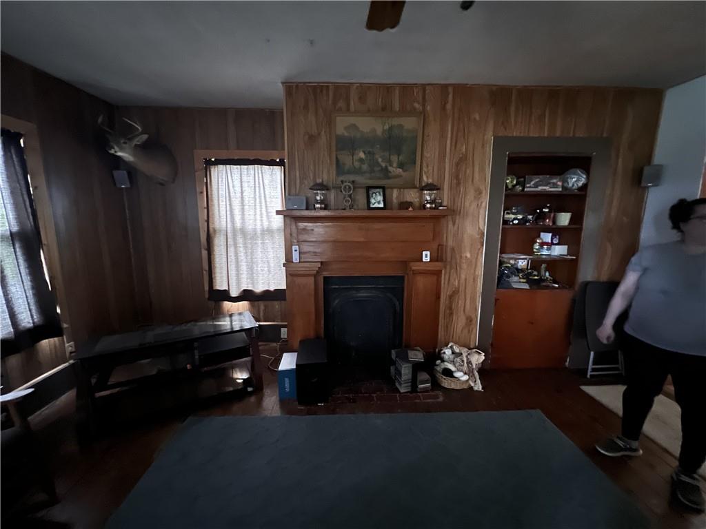609 Trout Run Road Punxsutawney, PA 15767 - Photo 12 of 34 a living room with furniture and a fireplace