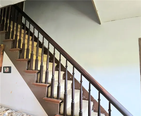 a view of an entryway with staircase