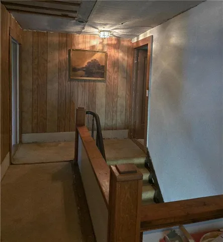 a bathroom with a shower and a sink